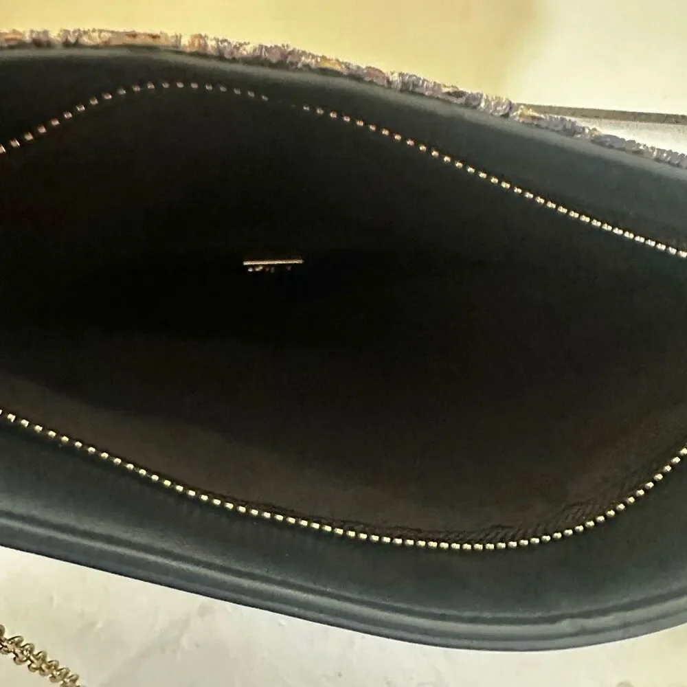 La Je  expandable clutch purse